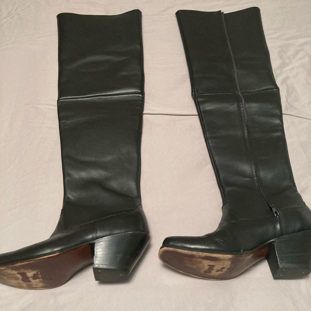 Thigh high boots by Miguel